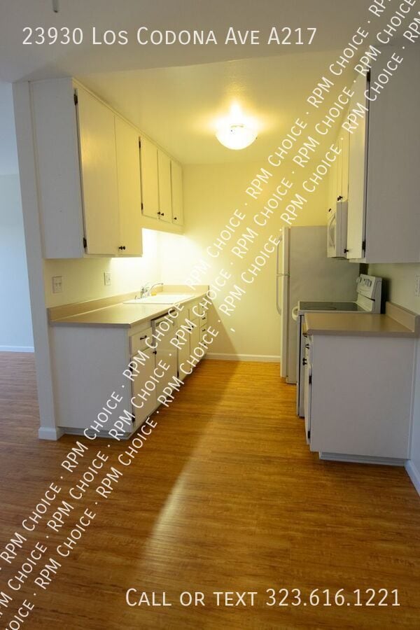 Building Photo - 23930 Los Codona Ave