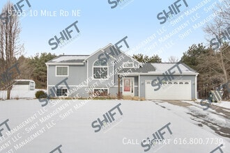 Building Photo - 9755 10 Mile Rd NE