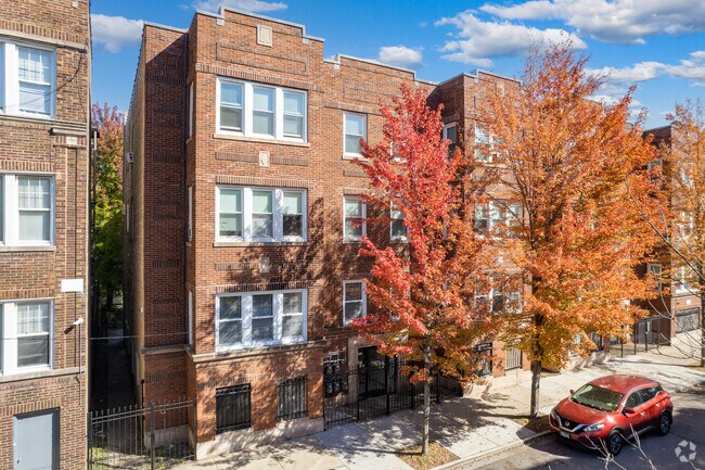 Building Photo - 7419-7435 S Colfax Ave