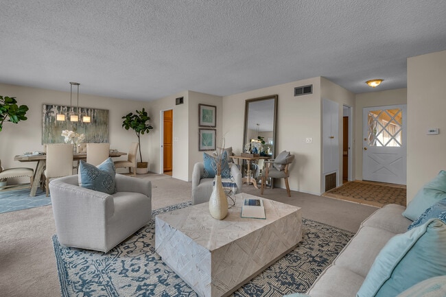Living room with dining area and fireplace - 28845 Briarhurst Dr