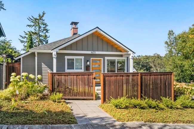 Building Photo - Timeless Remodeled Craftsman in Trendy Mad...