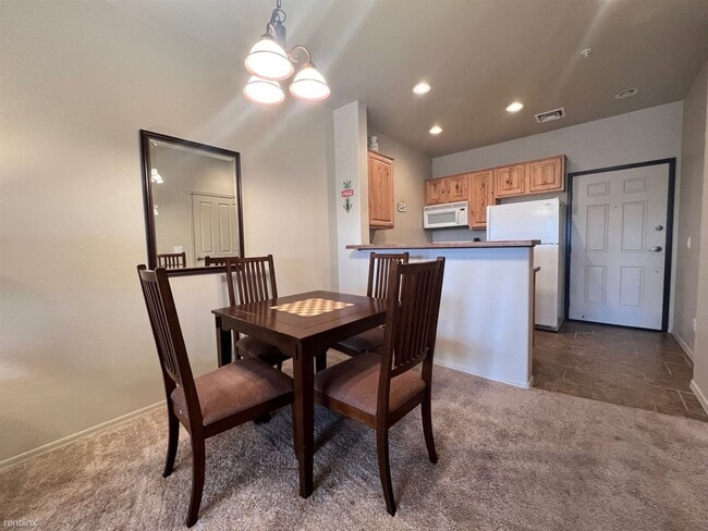Building Photo - 2 br, 1 bath Condo - 2403 Quarter Horse Tr...