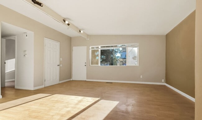 Building Photo - Bright Rambler in Quiet, Convenient Neighborhood