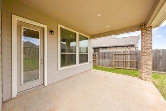 Building Photo - 8714 Windsong Trail Dr