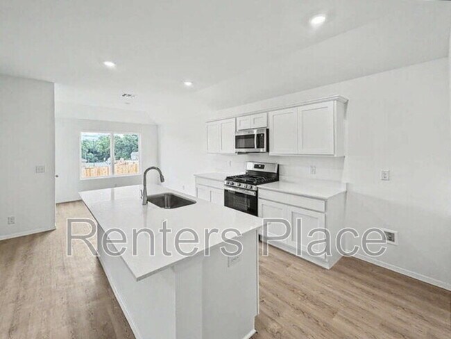 Foto del edificio - 7209 S Maple Ave