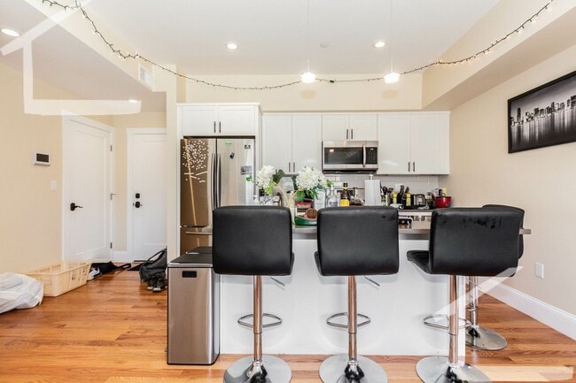 Photo - No Brokers Fee, Steps from Boston Lending, In-Unit Washer and Dryer, Central Heat/AC, Parking. Apartment