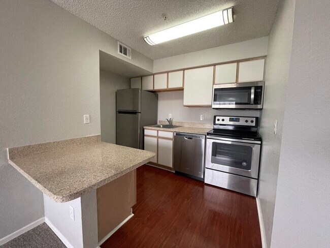 Building Photo - AVAILABLE ON JULY 1ST. BEAUTIFUL 1/1 CONDO...
