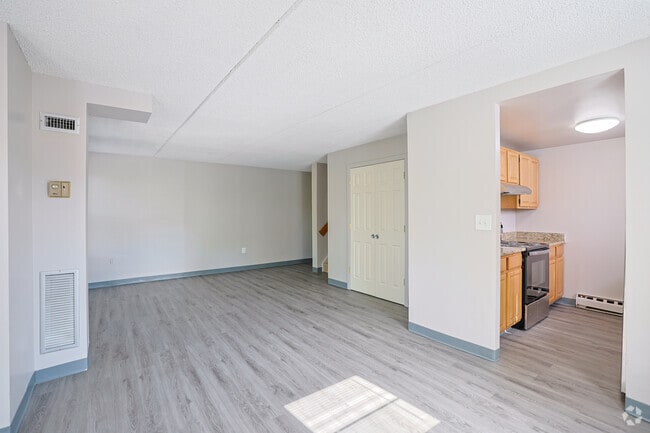2BR, 1BA - 848SF - Living room & Kitchen - Parmelee Court Apartments