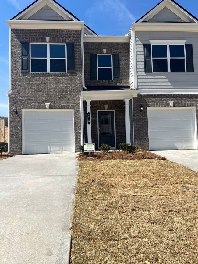 Building Photo - Beautiful Newly Constructed 3/.25 Townhome!