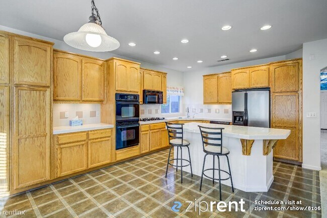 Building Photo - 4 br, 3.5 bath House - 7050 Emerald Street...