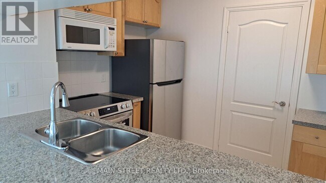 Photo du bâtiment - 3105-3121 HILLCREST Ave