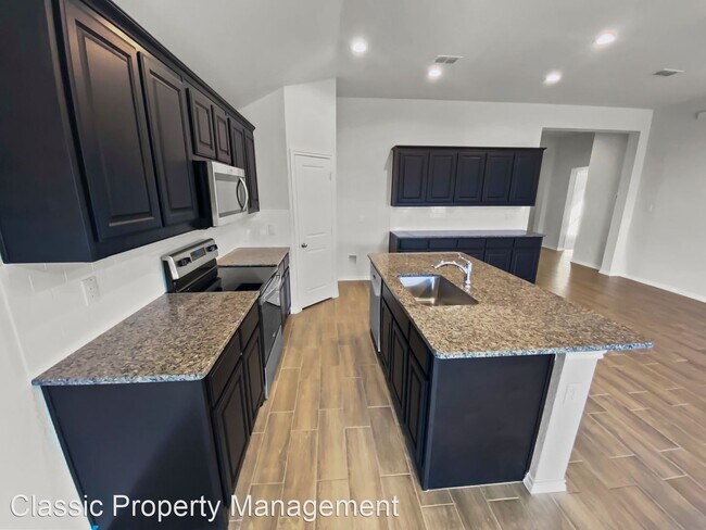 Building Photo - 4 br, 2 bath House - 10008 Ginkgo Lane