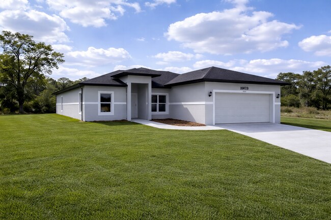 Foto del edificio - MODERN BRAND NEW 4BD/2BA RETREAT IN LEHIGH ACRES!