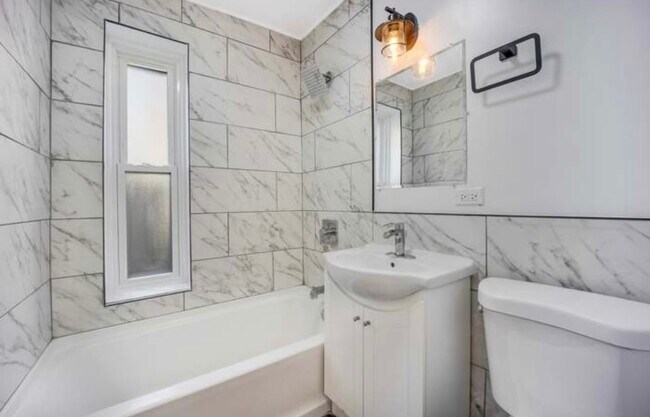 Building Photo - 7418 Kostner Ave