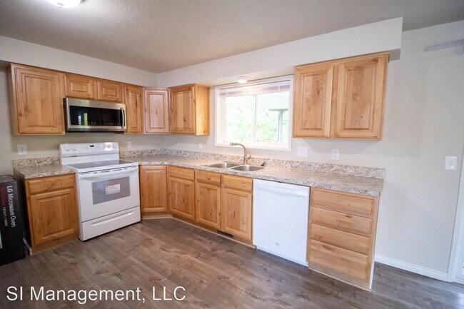 Building Photo - 4 br, 2 bath House - 5666 S Tinker St.