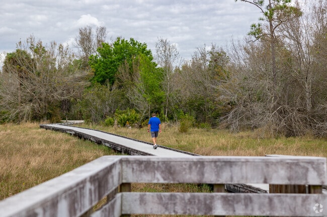 Prairie Pines Preserve features boardwalks and viewing platforms for wildlife near Jacaranda.