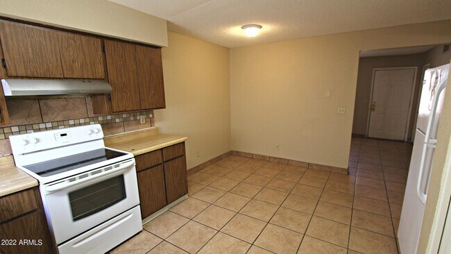 Building Photo - 6440 E Alder Ave