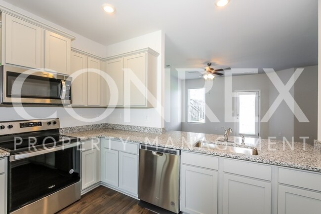 Building Photo - Stunning New Townhome with Great Location ...