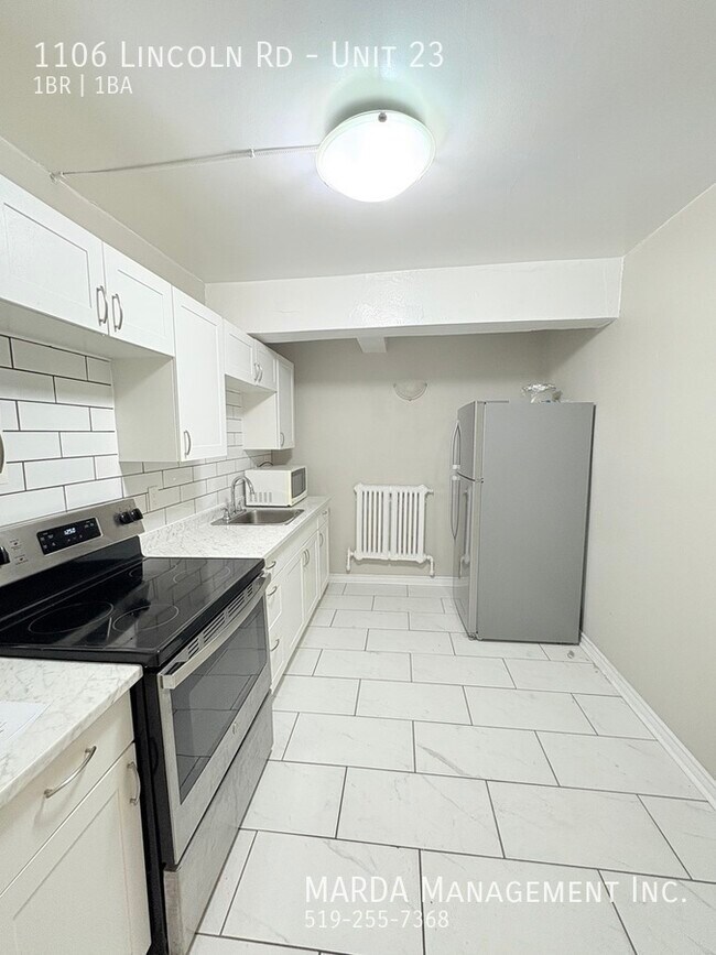 Photo du bâtiment - CHARMING WALKERVILLE 1BED 1BATH - PLUS HYR...