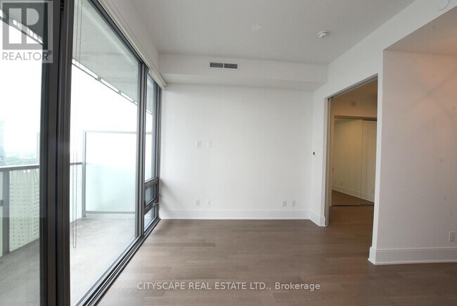 Building Photo - 50 Charles St E