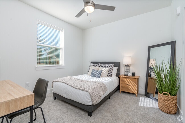 2BR, 2BA - 983SF - Primary Bedroom - Woods at Forest Crossing