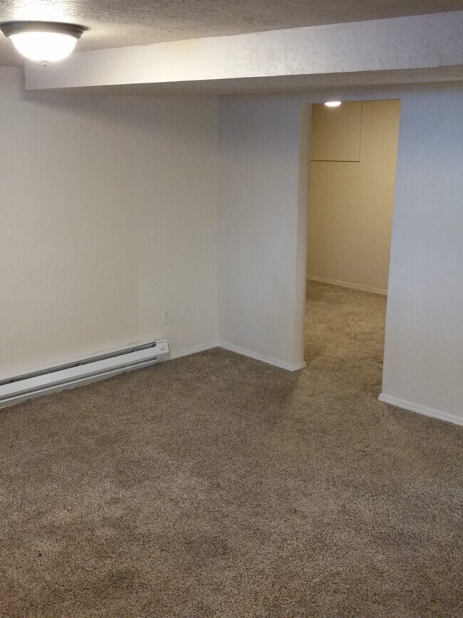 Living room alternate view, into bonus 2nd room - 1620 Blaine Street