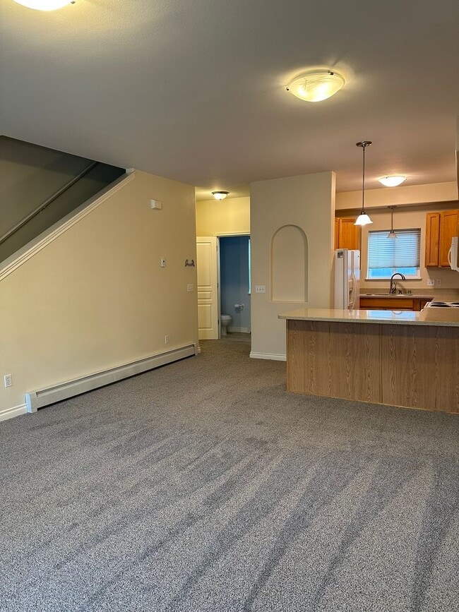 Building Photo - NEW CARPET THROUGHOUT| 2-Bedroom Townhome with Garage