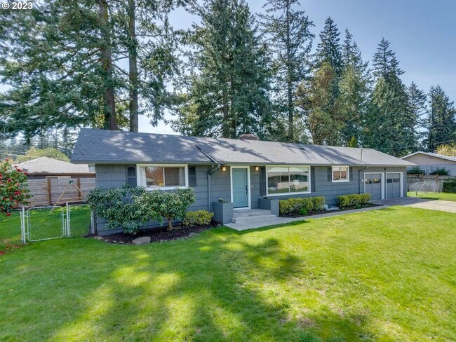 Building Photo - Stylishly Updated Mid-Century Gem on a Qui...