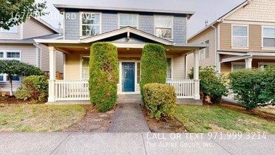 Building Photo - 1674 NE 103rd Ave