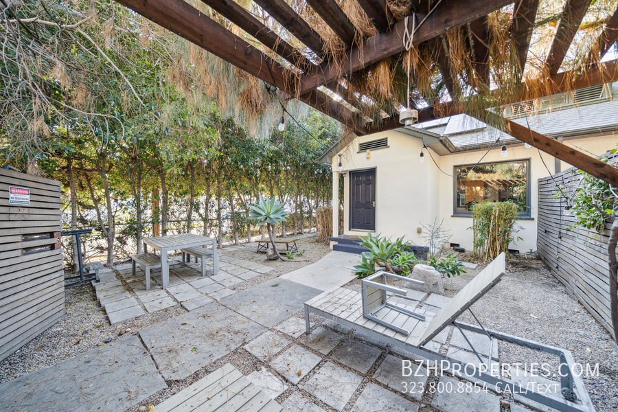 Primary Photo - Modern 2-Bed, 2-Bath with a Huge Private Y...