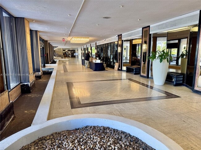 Building Photo - 5555 Collins Ave