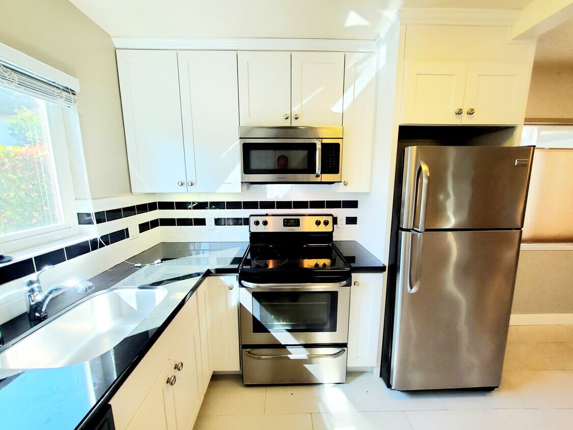 Primary Photo - spacious 1 upgraded bedroom 1/2 block from...