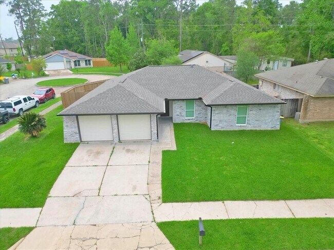 Foto del edificio - 5203 Mossgrey Ln