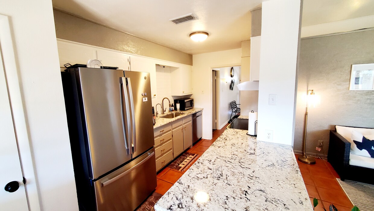 Kitchen with Granite Counters and SS Appliances - 3209 W Dengar Ave