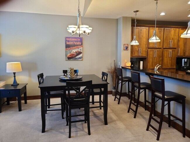 Building Photo - Deluxe Furnished Riverstone Condominium Fo...