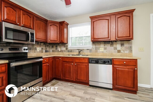 Foto del edificio - 5016 Trailwater Dr