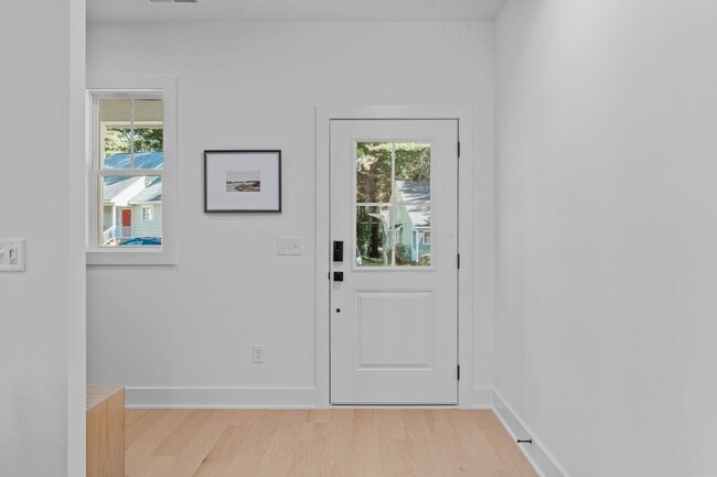 Building Photo - New Construction 4BD, 3.5BA End-Unit Ralei...