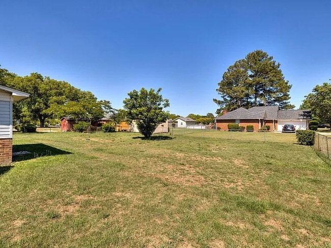 Building Photo - Lawn care included!