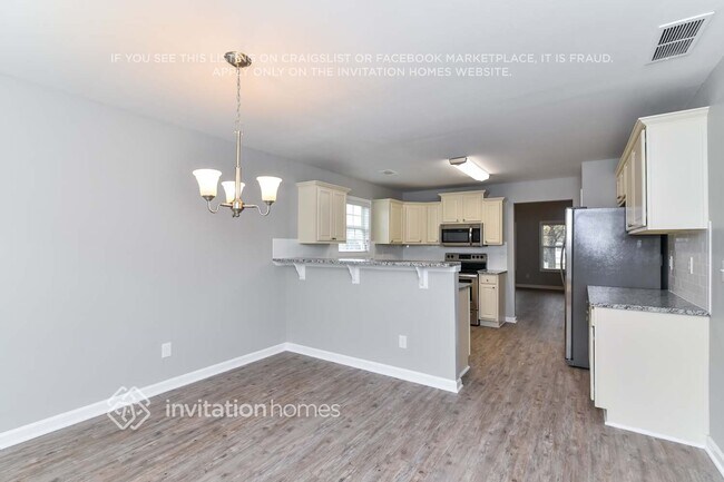 Foto del edificio - 6422 Grand Hickory Dr