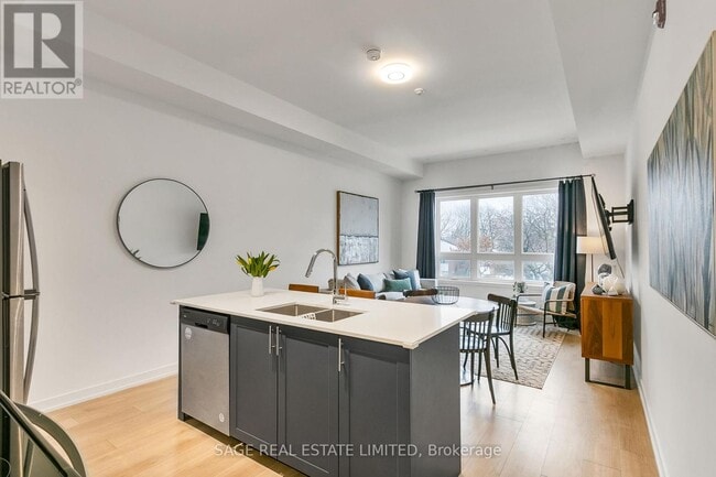 Building Photo - 3686-3686 St Clair Ave E