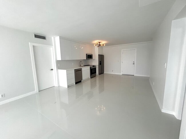 Building Photo - Fully Renovated East-Facing 2BR/2BA + Bonus Room | Ocean Views | In-Unit W/D
