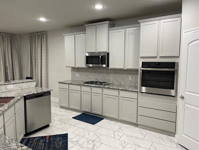 Foto del edificio - 5026 Lacebark Pne Trl