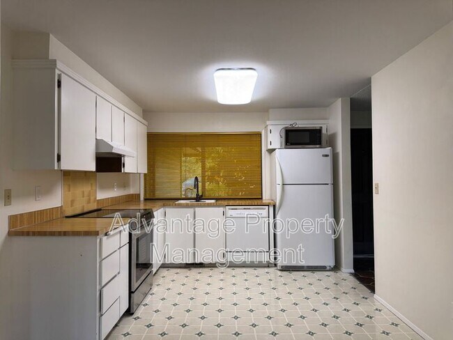 Foto del edificio - 1440 NW Meadowgreen Pl