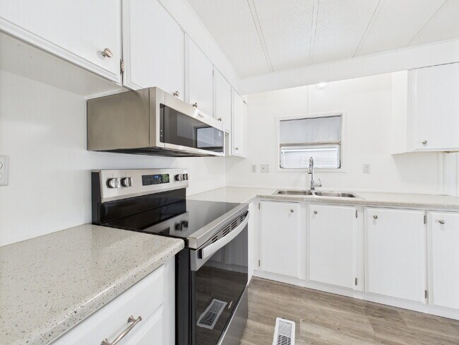 Building Photo - Completely Remodeled & Move-In Ready Home ...