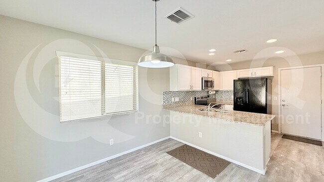 Foto del edificio - 6032 E Desert Spoon Ln