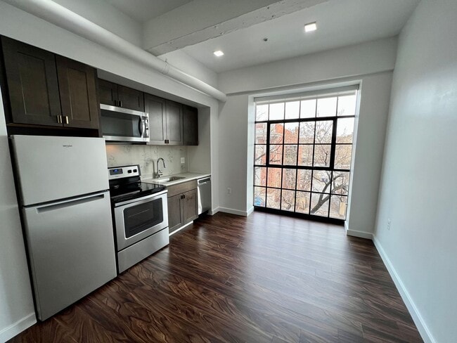 Photo - 824 N Calvert St Apartments