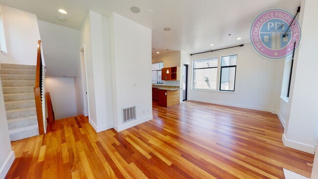 Building Photo - Riverfront Location, Luxury Townhome - End Corner Unit, Two En-Suites, Attached Garage