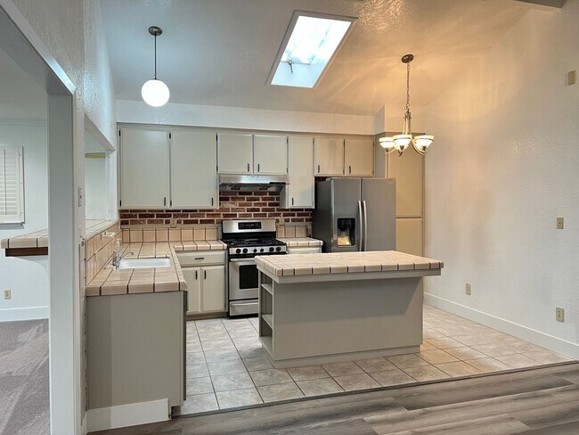 Building Photo - Spacious Four Bedroom Three Bathroom Home