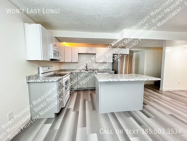 Building Photo - 3 Bedroom/2 Bath Garden Level Apartment in...