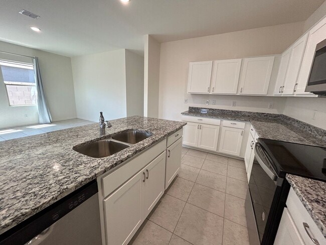 Building Photo - 4 BR, 3 bath, Beautiful Maricopa home in p...